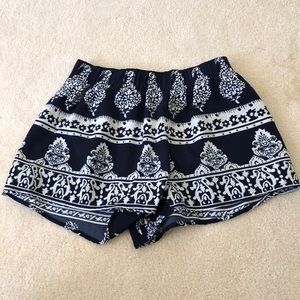 Navy and white shorts. Size small